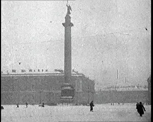 Milling: People Milling Through A Snowy Square Containing