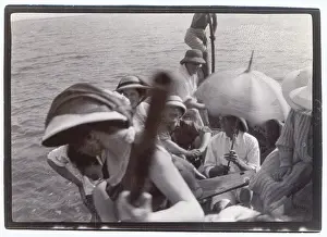 Sepia Images: People on an outing in a punt, Middle East