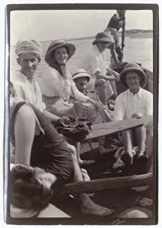 Sepia Images: People on an outing in a punt, Middle East