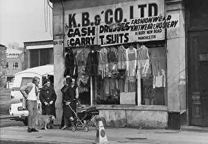 Shabby: People outside a clothing shop