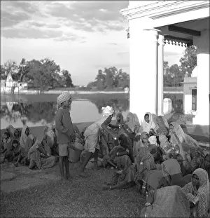 Madhya: People outside colonial building, Mandu, Central India