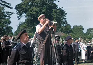 Cinematography: People in a park, with cine camera