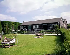 Chalets: People relaxing at a holiday camp, Devon