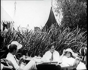 Henley: People Relaxing in a River Boat At Henley On Thames