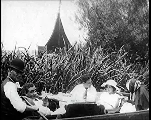 Henley: People Relaxing in a River Boat At Henley On Thames