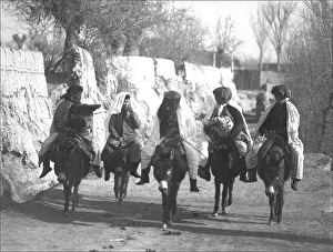 Ponsonby: Five people riding donkeys, Kashgar