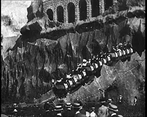 Coaster: People Riding Fairground Rides In Brighton