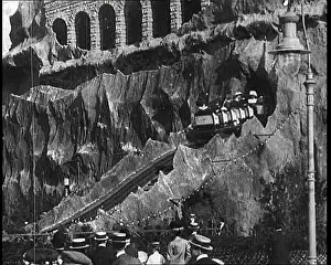 Coaster: People Riding Fairground Rides In Brighton