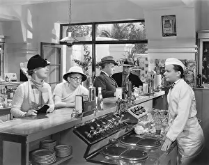 Racks: People at a soda fountain