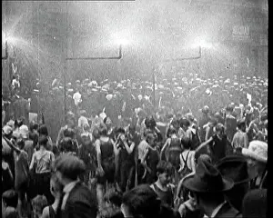 Heatwave: People Being Sprayed With Water During A Heatwave