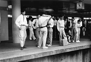 Commuter: People on a station platform, Hong Kong