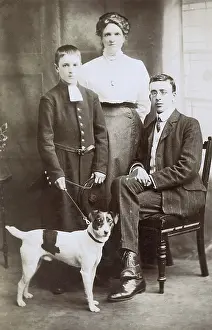 Cassock: Three people with terrier dog