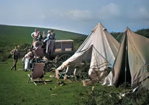 Chagford: People with vehicle and tents