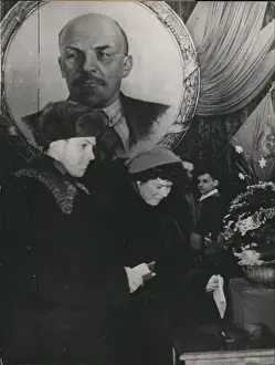 Udssr: People voting in Soviet Union under picture of Lenin