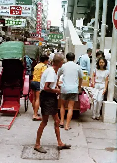 Crowed: People walking in different directions on crowded street, Ho