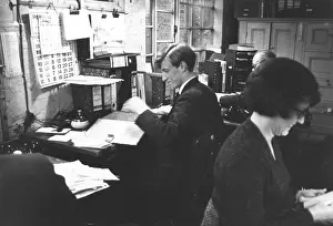 Clips: Three people at work in an office