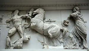 Giants: Pergamon Altar. Horse of Helios carriage attacking a giant
