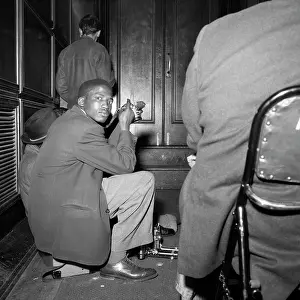 Magubane: Peter Magubane sitting and facing the camera