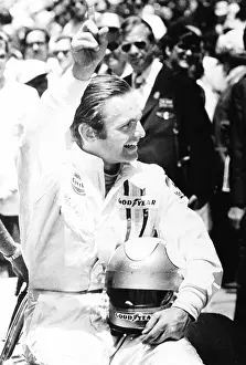 Heirs: Peter Revson held up one finger to indicate he