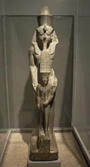 Nemes: Pharaoh Ramses IV next to god Amun. Egypt