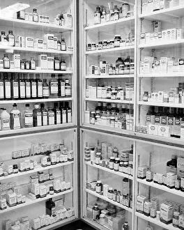 Prescription: Pharmacy Interior Storage Shelves Containing Supplies