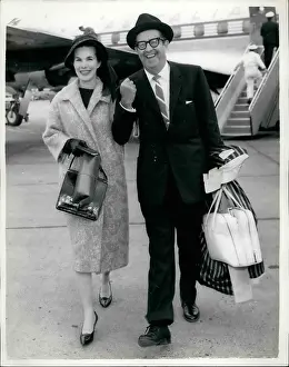 Silvers: Phil Silvers, American comedian, and wife Evelyn, London