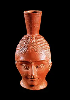 Phoenician: Phoenician anthropomorphic head, on a wine Jug