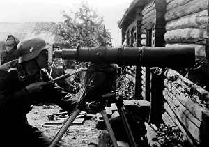 Photographing: Photo reporter with a telephote on the Eastern Front, 1942