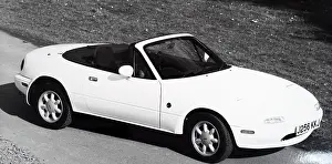 Mazda: A photograph of a Mazda MX-5