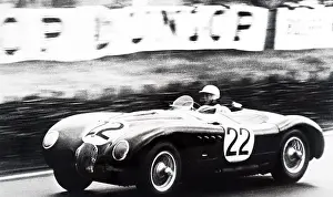 Formula: A photograph of Stirling Moss during the 24 Hours