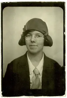 Passport: Photograph of a woman in a hat