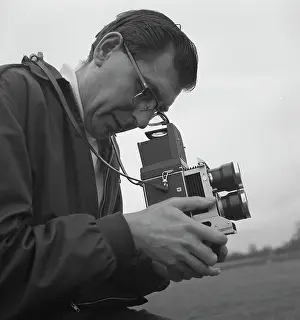 Anorak: Photographer with his camera