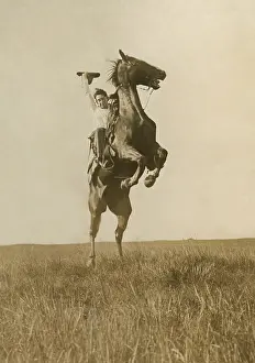 Broncos: Photographer Erwin E. Smith Riding a sunfisher