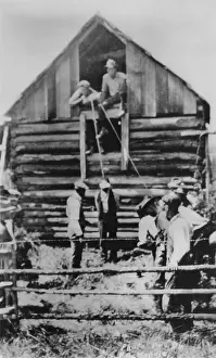 Vigilantes: Photographic postcard of a few men preparing ?