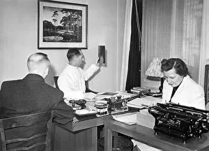 Occupational: Physician interpreting a radiograph, 1943