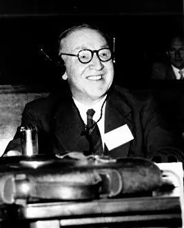 Cockcroft: Physicist John Cockcroft with headphones on