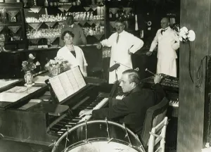 Immigration: Piano player in a cafe, 1931