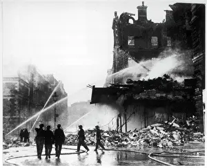 Smouldering: PICCADILLY BOMBED