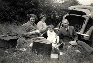 Grandma: Picnic out of the boot of a Morris 8 E-series