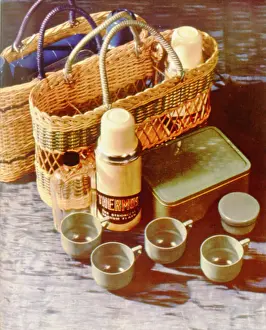 Sandwich: Picnic items, including a thermos flask