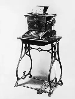 Correspond: Picture of a typewriter on a stand
