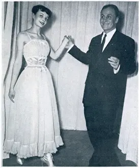 Centimetre: Pierre Balmain with one of his designs 1948
