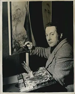 Faintly: Pietro Annigoni, Italian painter, in his studio