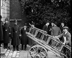 Unloaded: A Pile Of Folding Chairs Being Unloaded From