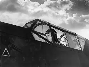 Aerodrome: Pilot in the cockpit of a fighter jet, 1938