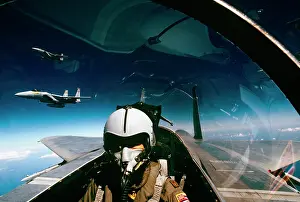 Yonder: Pilot of F-15 Eagle with Two Other Jets in the Formation
