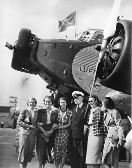 Hired: A pilot and future stewardesses in front of a Junkers Ju 52
