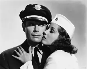 Stewardesses: Pilot and stewardess having romantic moment