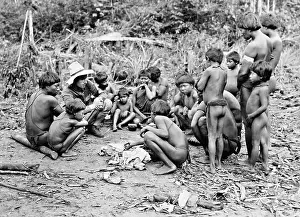 Dropped: A pilot surrounded by Amazon Indians, 1934