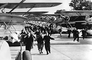 Crews: Pilots and crew run to their planes, 1939
